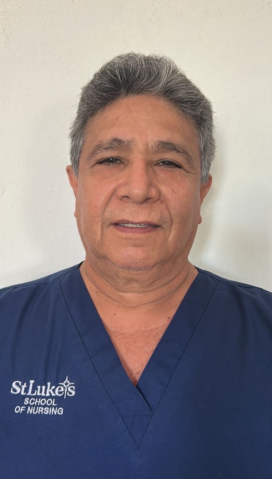 Dr. Carlos René Bello Rendón
