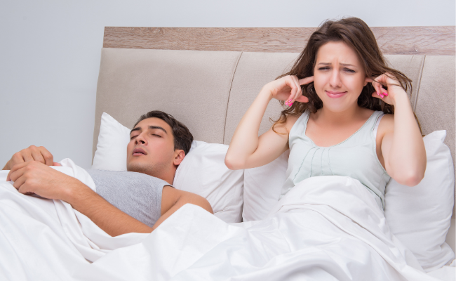 What causes snoring and how treated?