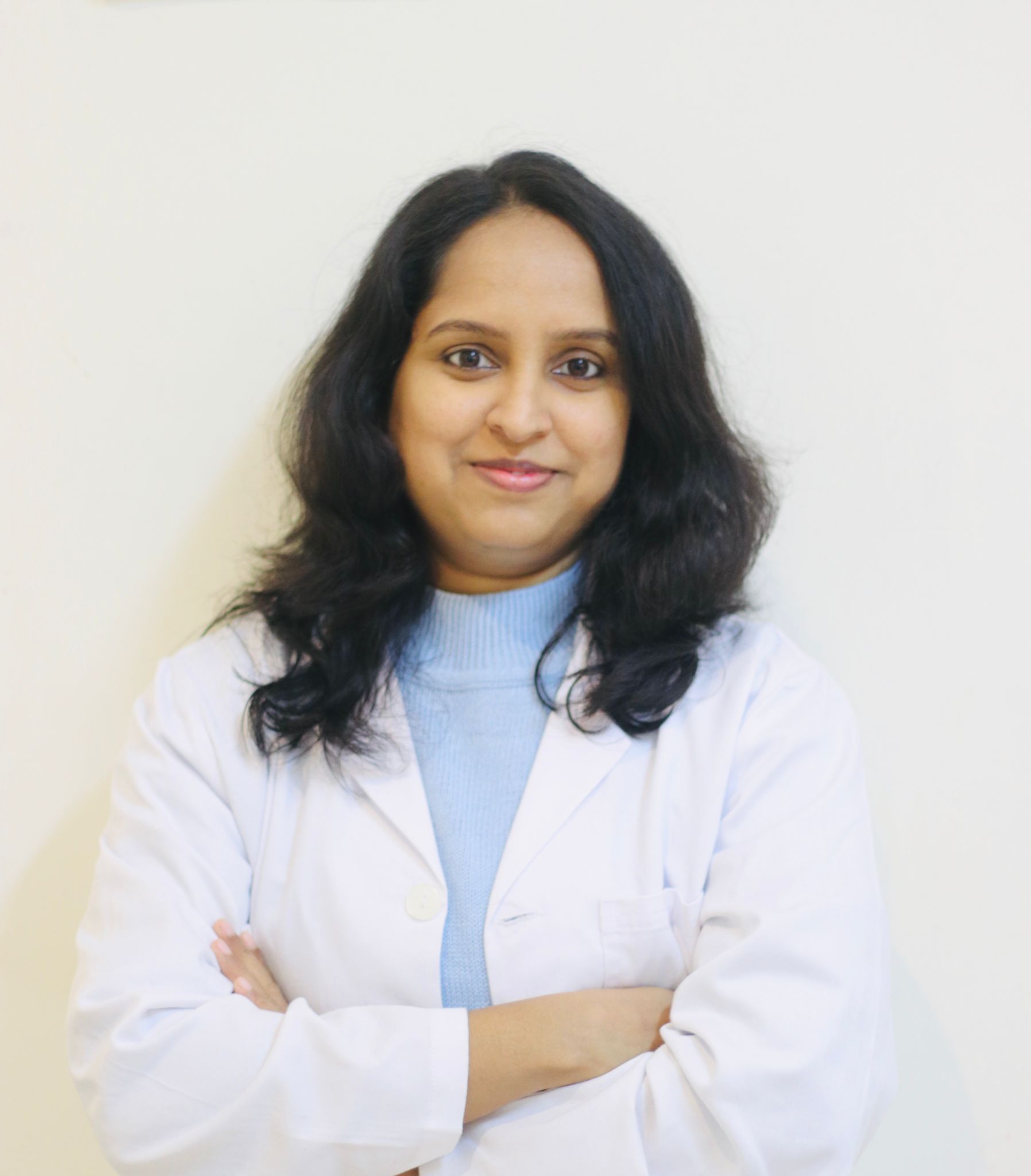 Dr. Anila K